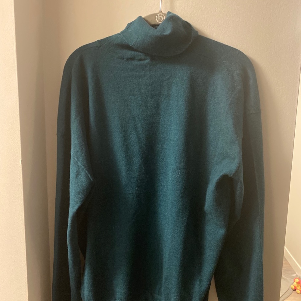 Long sleeved green sweater